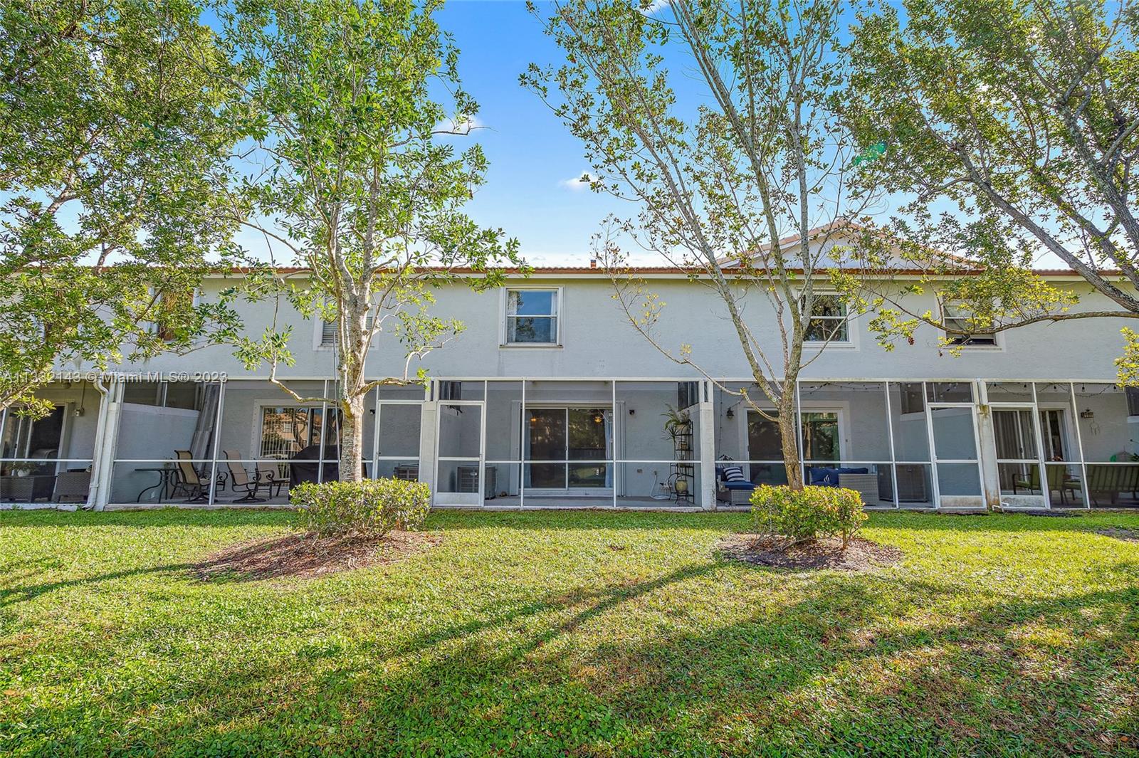 232 Timberwalk Trail Jupiter, FL 33458 - Photo 20 of 33 front view of a house with a yard
