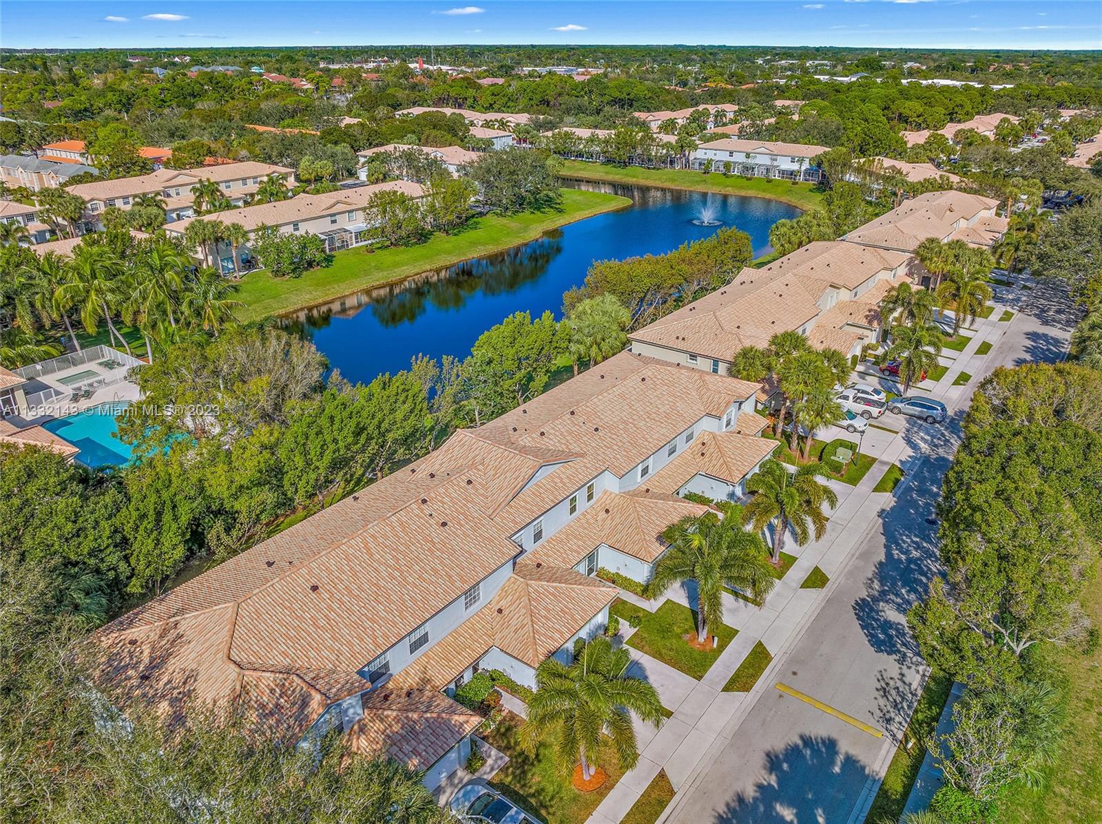 232 Timberwalk Trail Jupiter, FL 33458 - Photo 22 of 33 an aerial view of residential houses with outdoor space