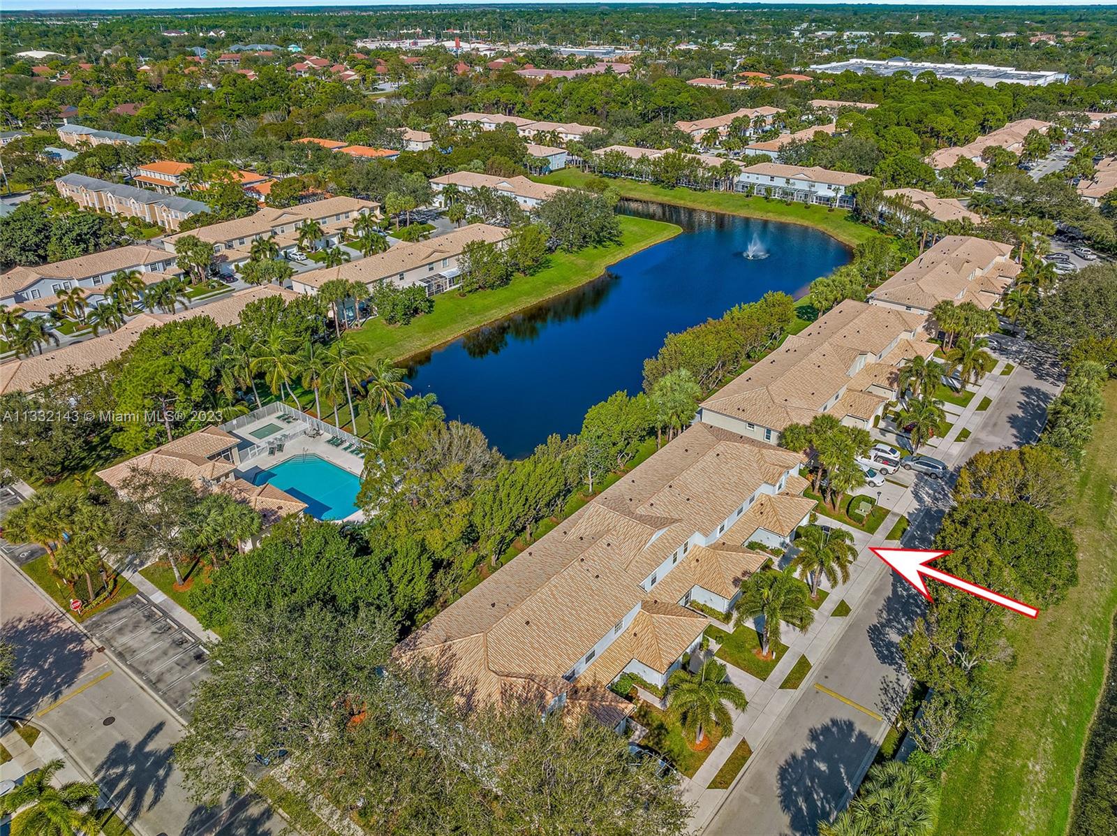 232 Timberwalk Trail Jupiter, FL 33458 - Photo 23 of 33 an aerial view of residential houses with outdoor space