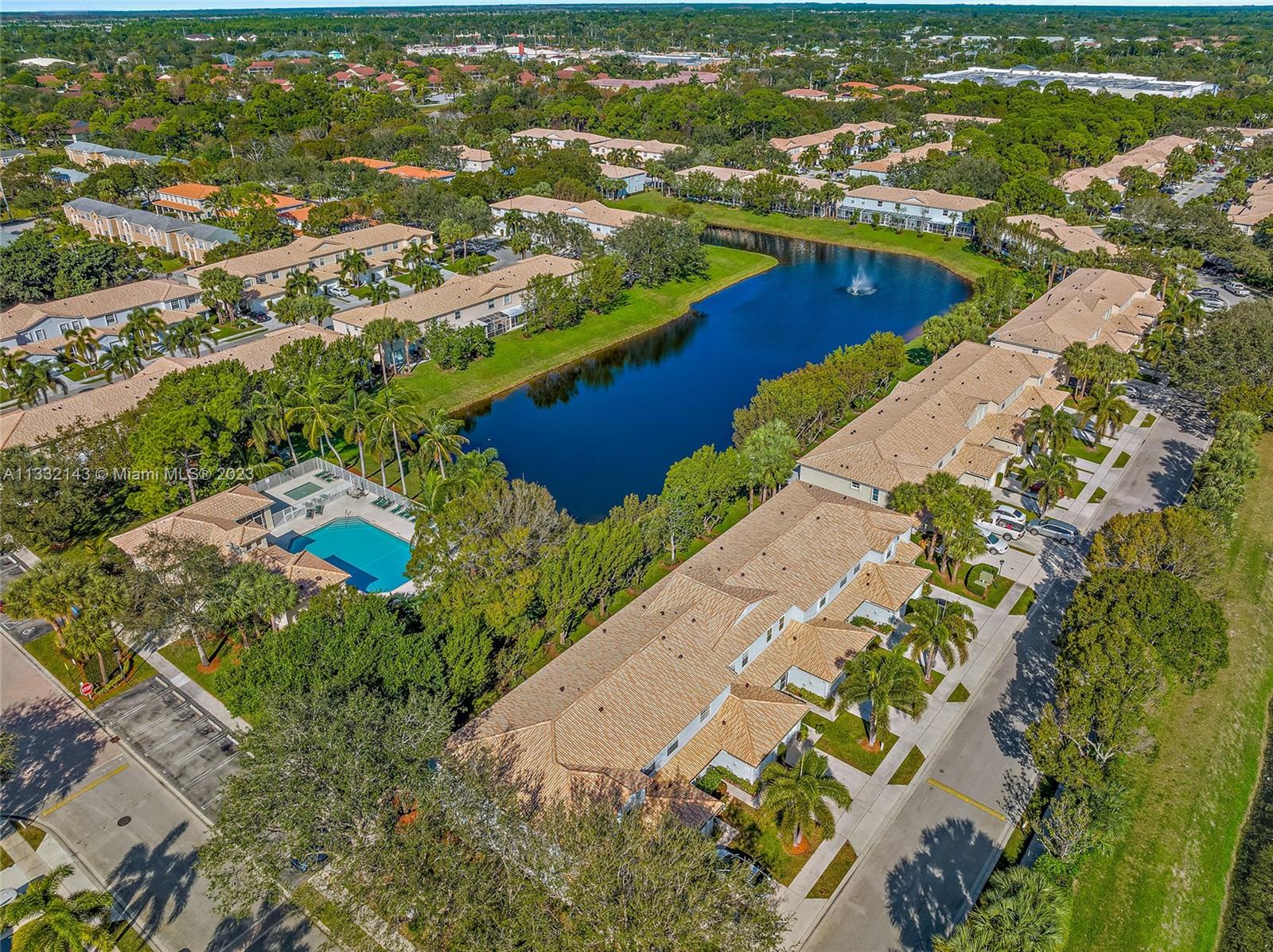 232 Timberwalk Trail Jupiter, FL 33458 - Photo 24 of 33 an aerial view of residential houses with outdoor space