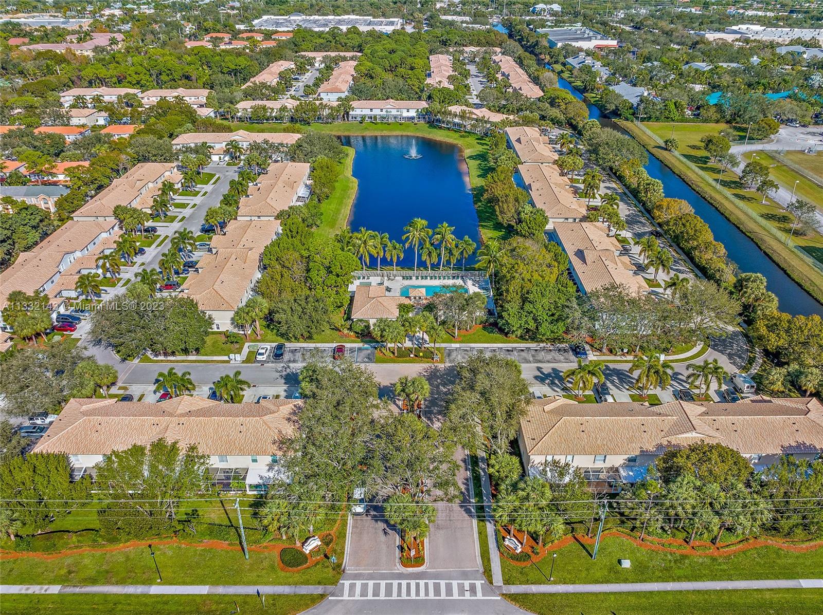 232 Timberwalk Trail Jupiter, FL 33458 - Photo 27 of 33 an aerial view of residential houses with outdoor space and swimming pool
