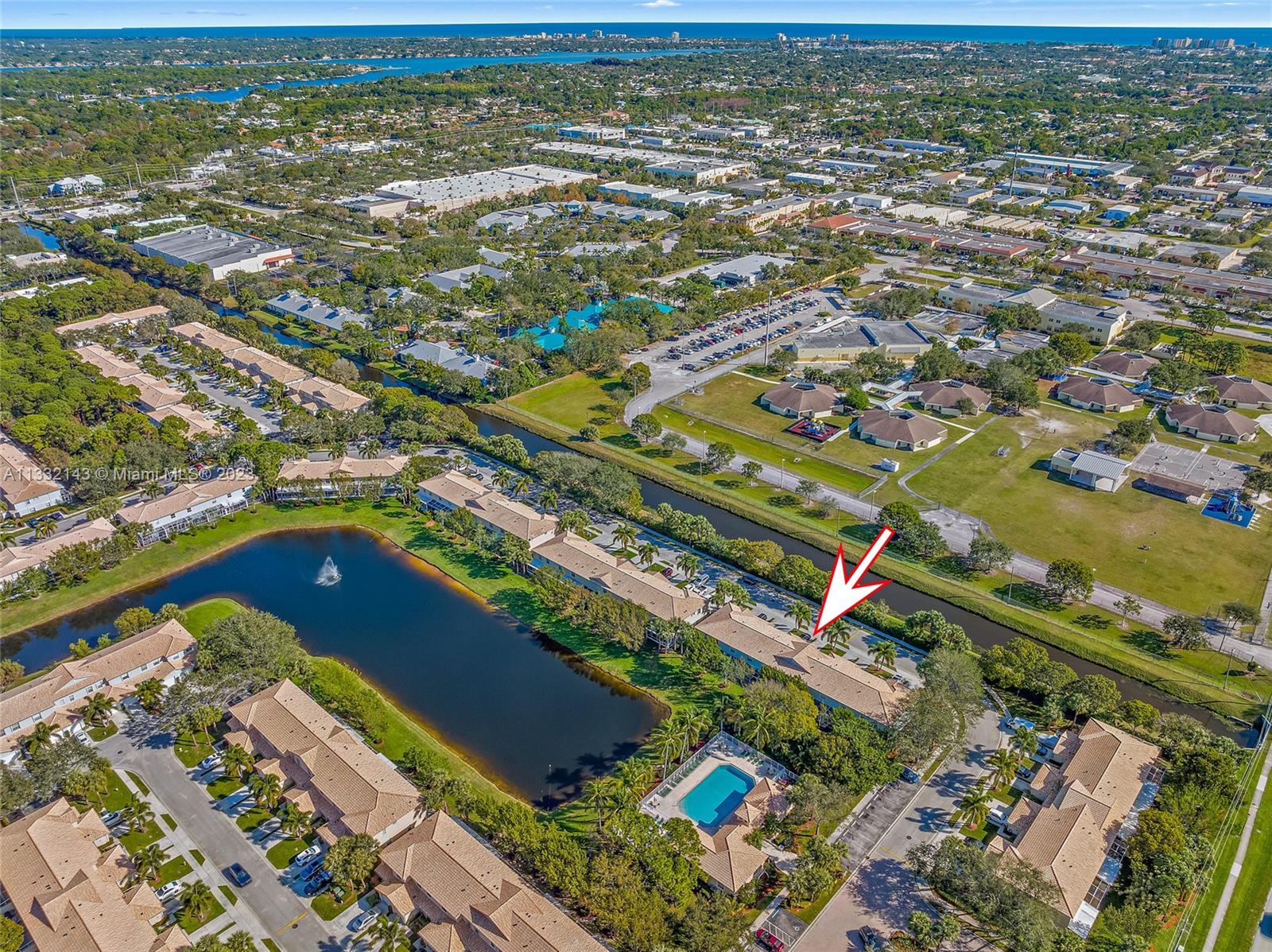 232 Timberwalk Trail Jupiter, FL 33458 - Photo 28 of 33 an aerial view of residential houses with outdoor space