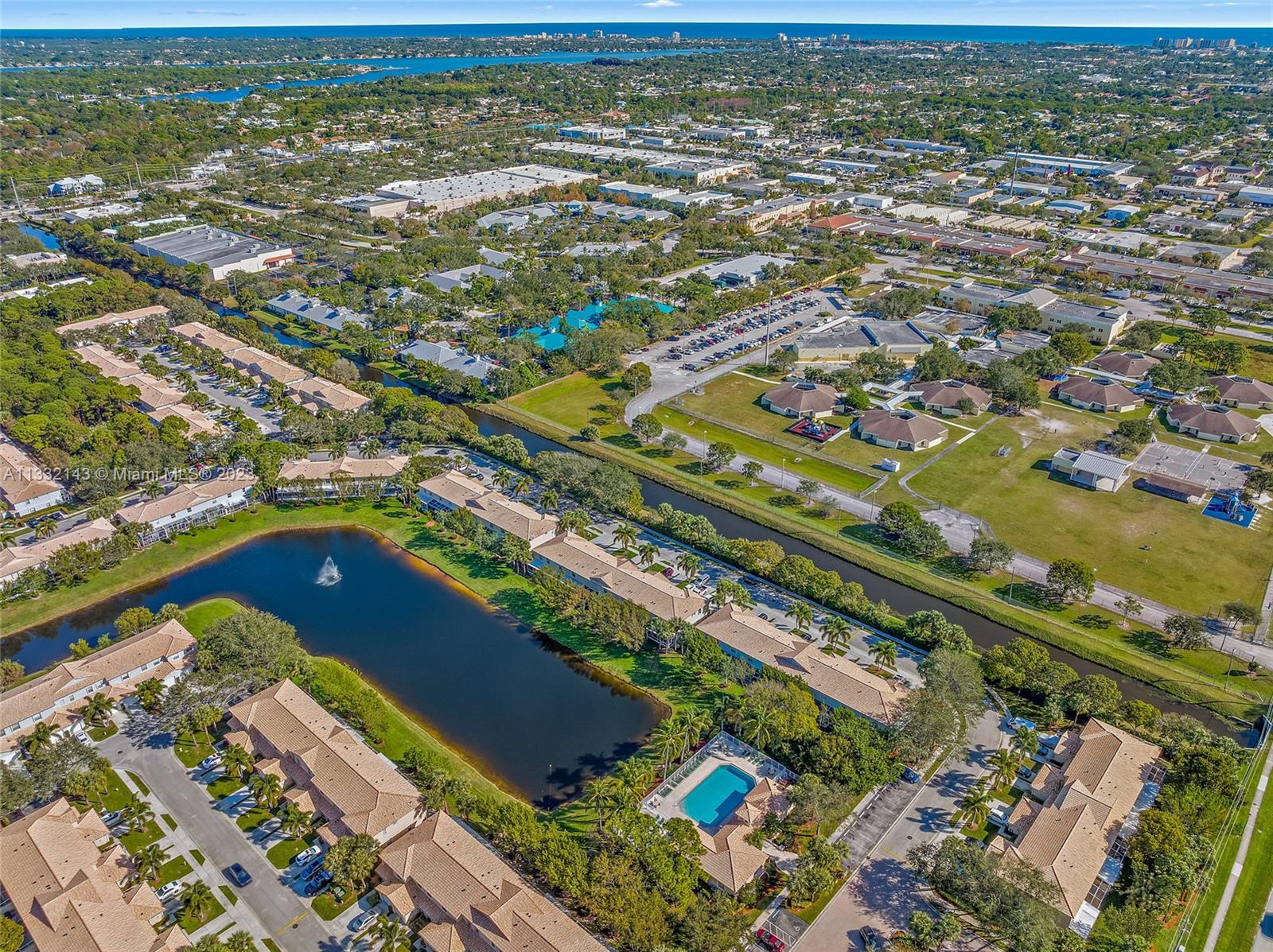 232 Timberwalk Trail Jupiter, FL 33458 - Photo 29 of 33 an aerial view of residential houses with outdoor space