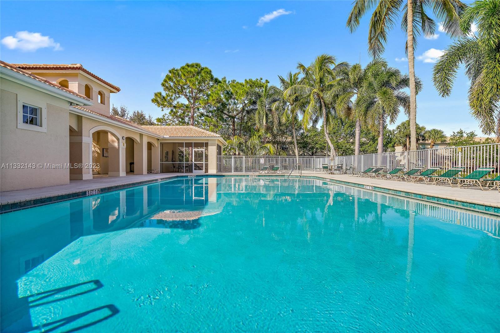 232 Timberwalk Trail Jupiter, FL 33458 - Photo 32 of 33 a view of a house with a backyard