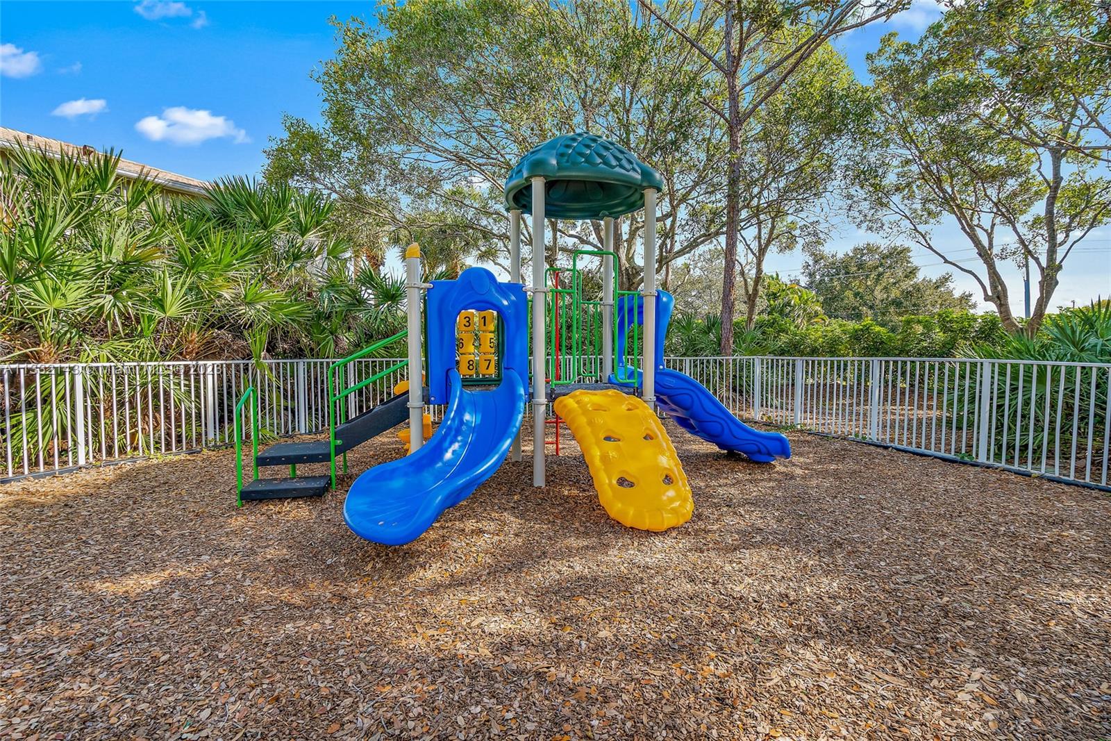 232 Timberwalk Trail Jupiter, FL 33458 - Photo 33 of 33 a view of a park with slide and a fire pit