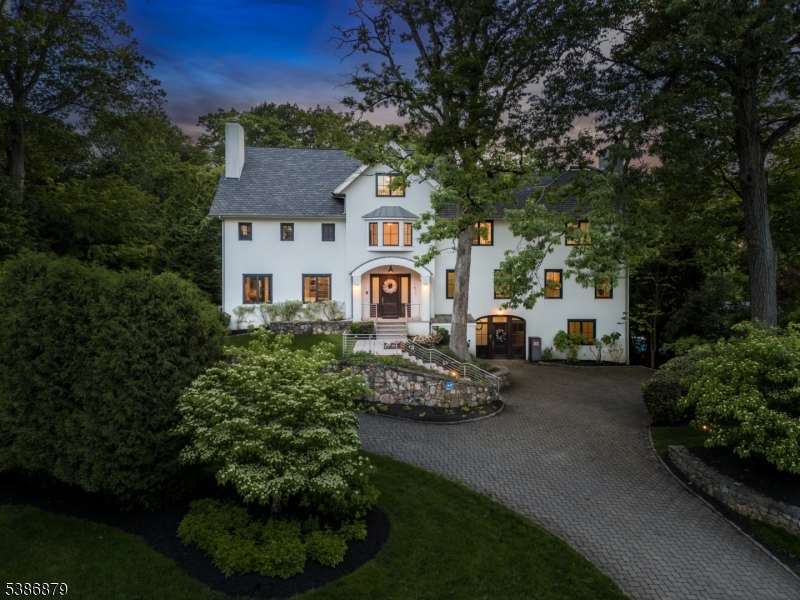 60 Fernwood Road Summit, NJ 07901 - Photo 2 of 50 a front view of a house with garden