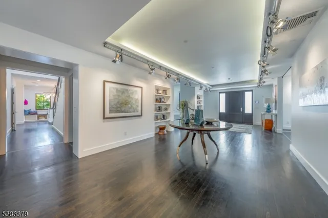 a view of a living room and dining room