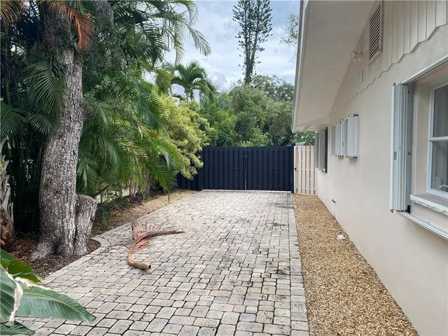 a view of a garden with a fountain