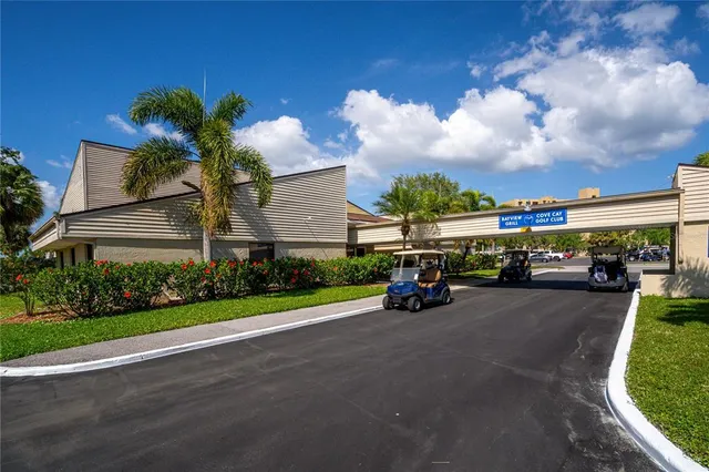 a view of a street with cars