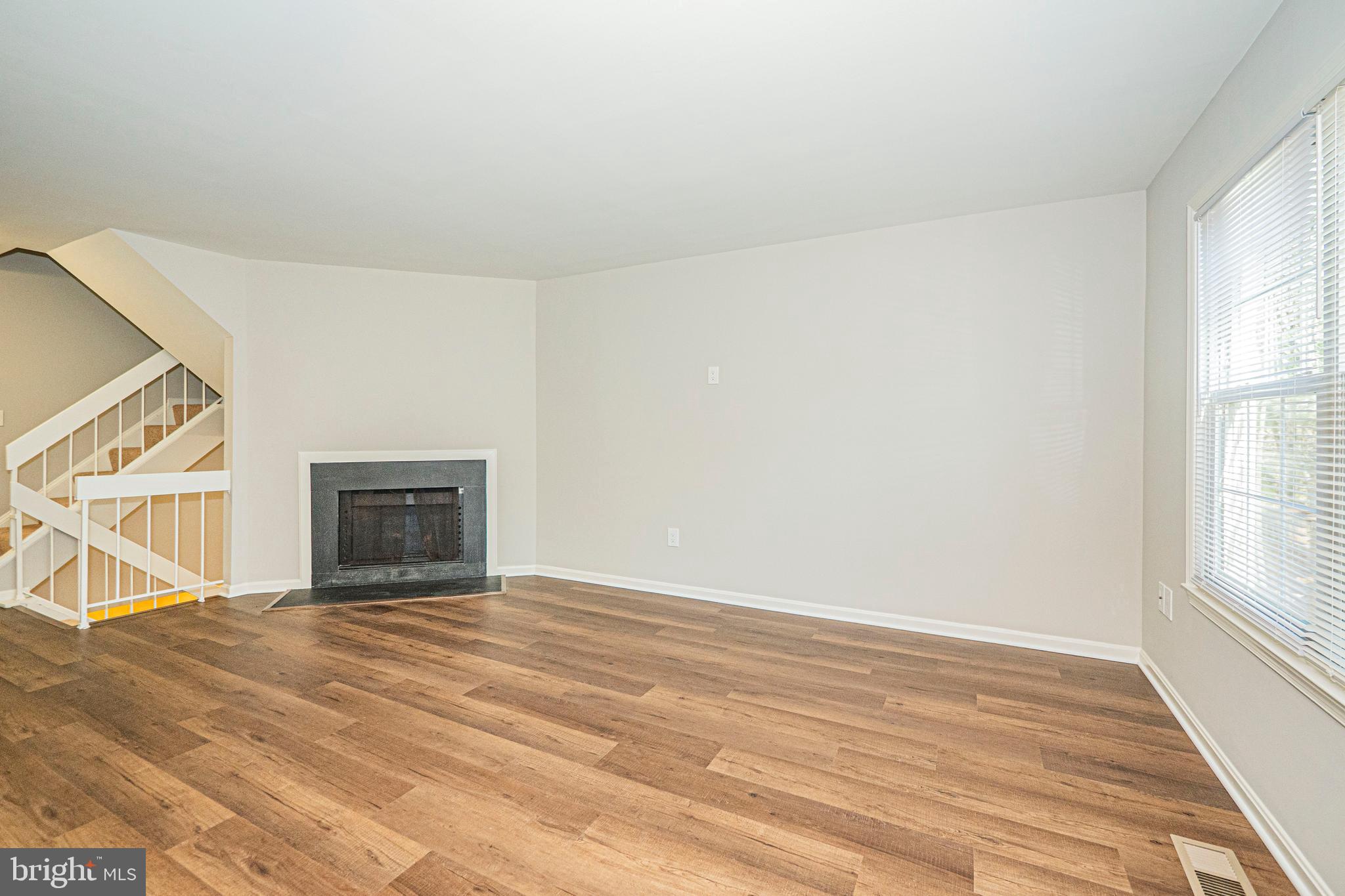 101 Kestrel Court Gaithersburg, MD 20879 - Photo 21 of 53 Main Level - Living Room w/ Fireplace