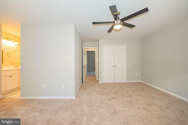 a bathroom with a shower sink and mirror