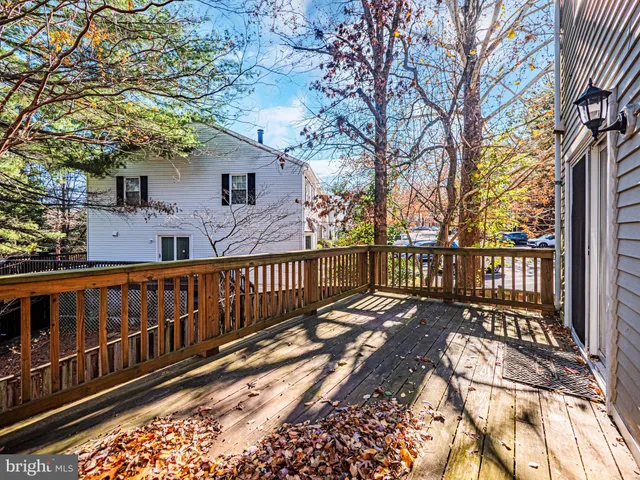 a view of outdoor space with wooden fence
