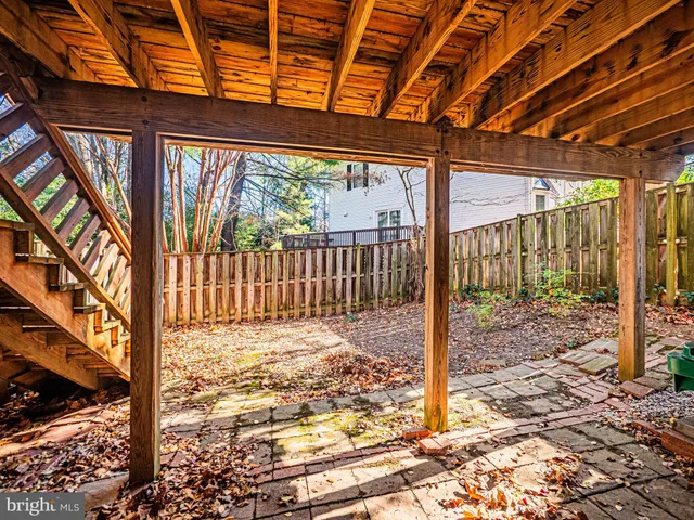 a front view of a house with a fence