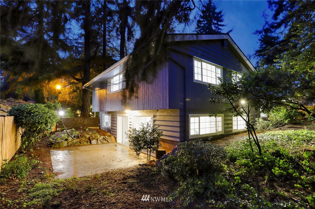 13534 Sherman Road Northwest Seattle, WA 98177 - Photo 2 of 20 a front view of a house with a yard