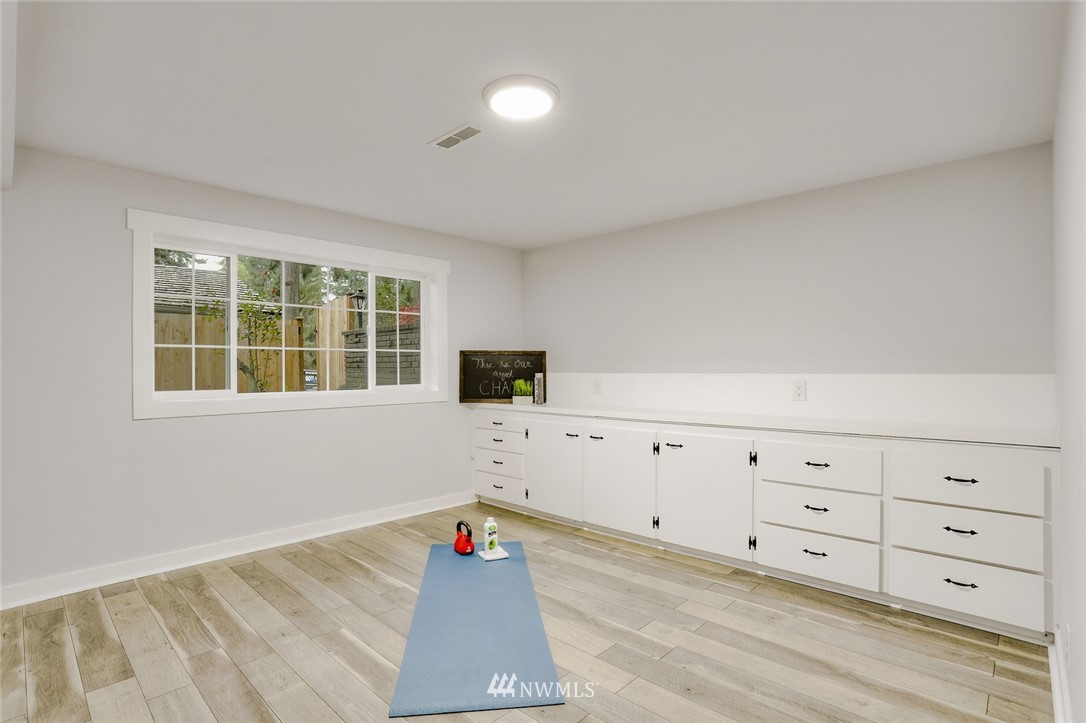 13534 Sherman Road Northwest Seattle, WA 98177 - Photo 12 of 20 an empty room with windows