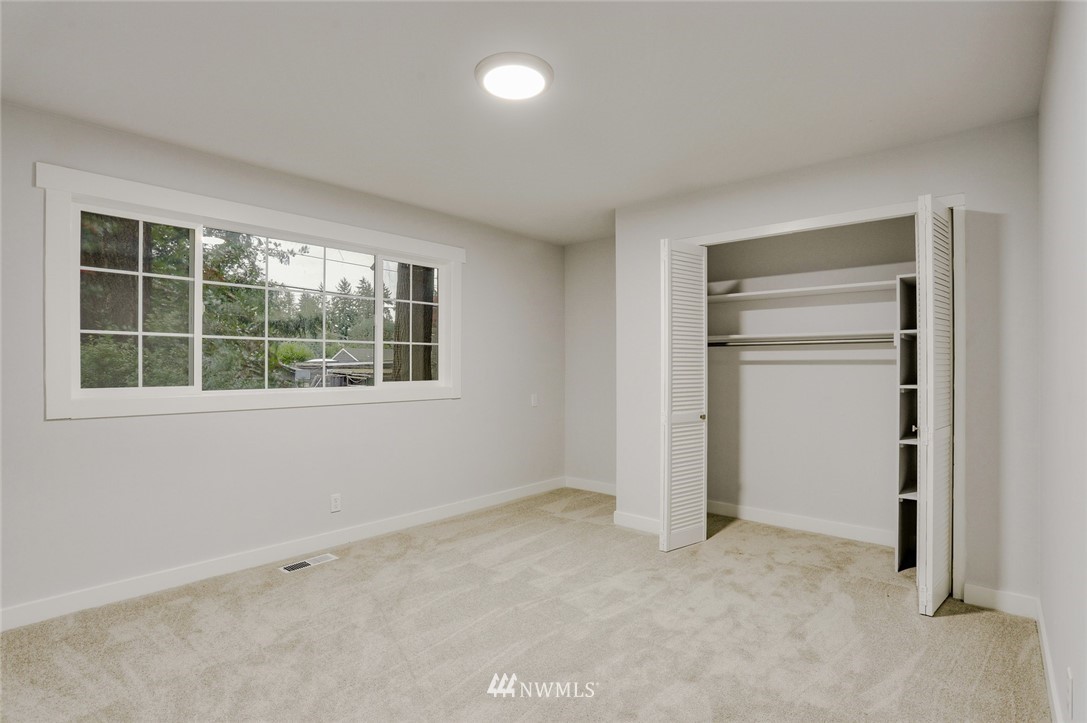 13534 Sherman Road Northwest Seattle, WA 98177 - Photo 16 of 20 an empty room with a window