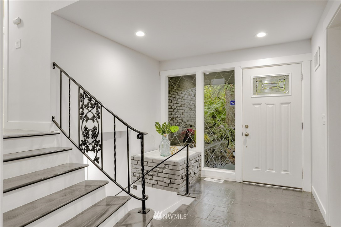 13534 Sherman Road Northwest Seattle, WA 98177 - Photo 4 of 20 a view of an entryway with wooden floor