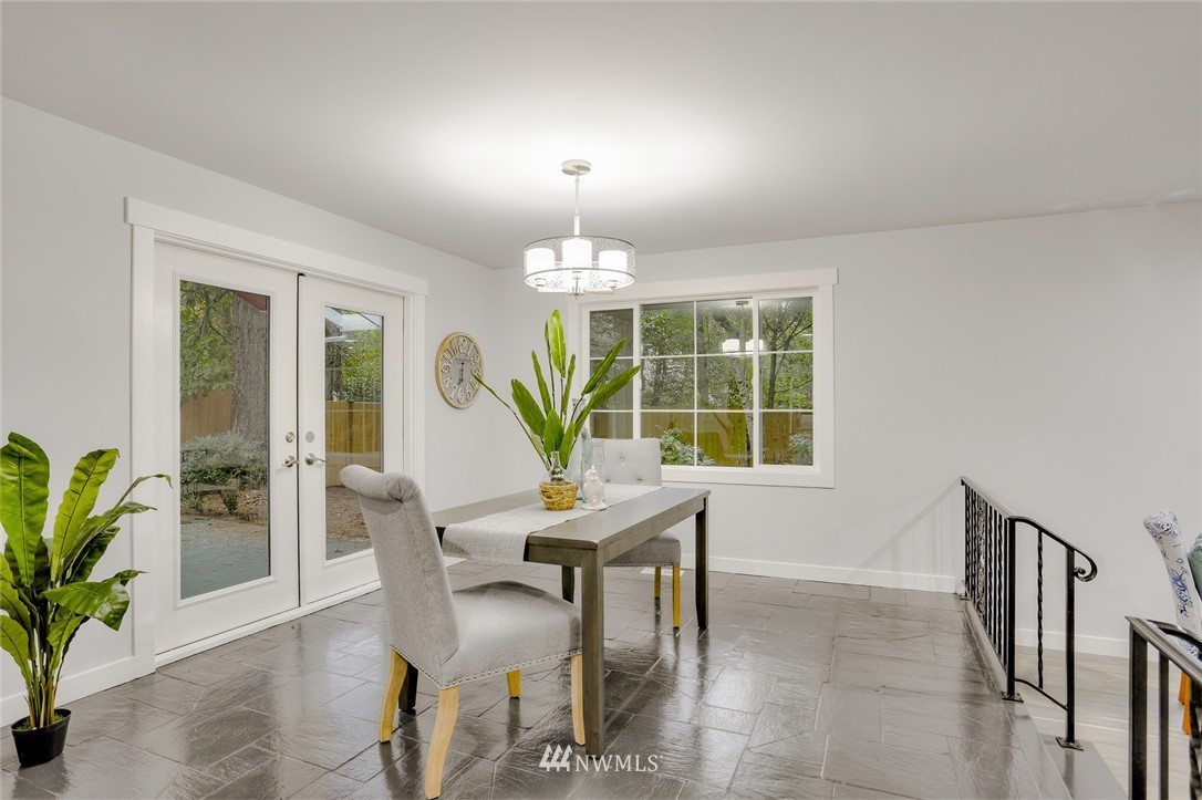13534 Sherman Road Northwest Seattle, WA 98177 - Photo 7 of 20 a dining room with furniture and window