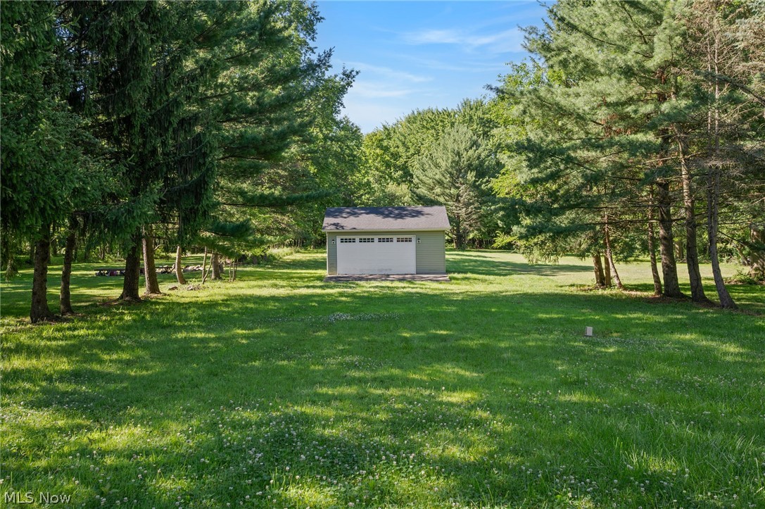 6832 Hillside Road Independence, OH 44131 - Photo 4 of 44 Yard with view of additional garage