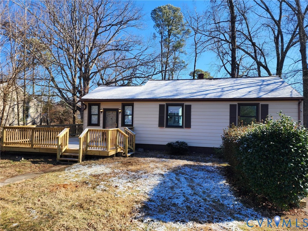 3005 Collins Road Richmond, VA 23223 - Photo 2 of 7 a front view of a house with yard and trees
