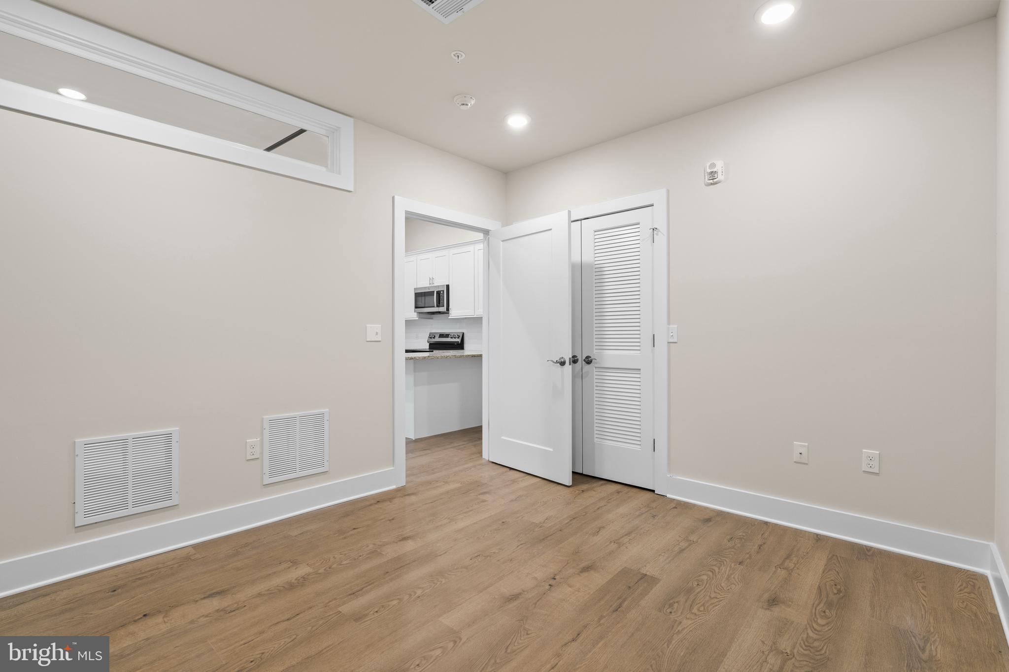 30 West Broad Street Souderton, PA 18964 - Photo 21 of 34 a view of empty room with wooden floor and cabinet