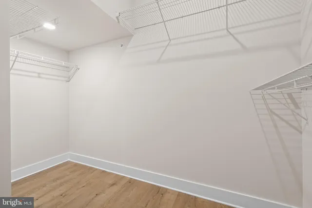 a view of a room with racks on the wall