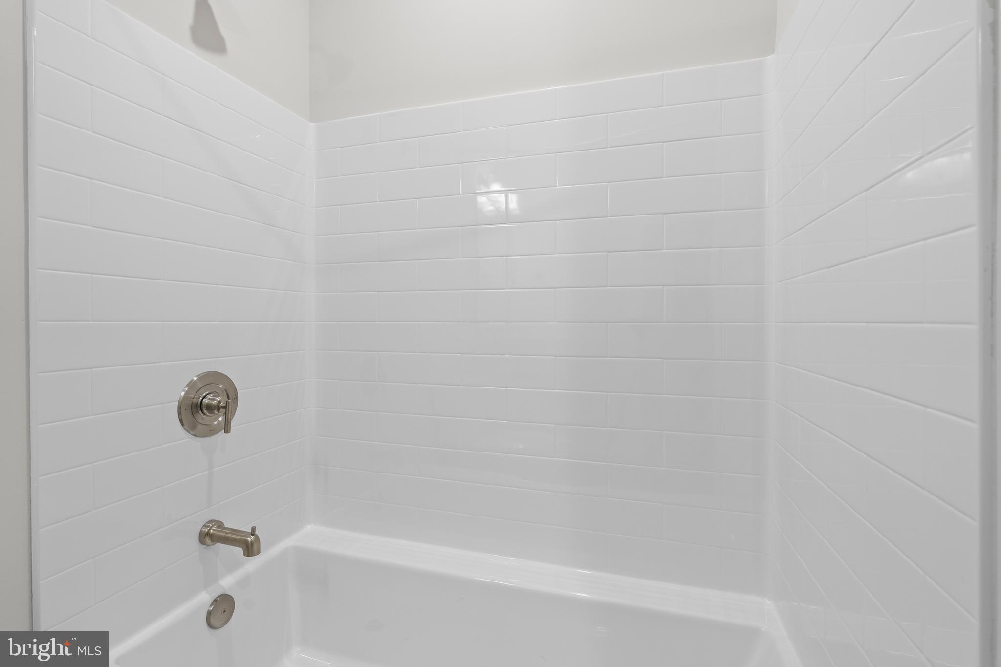 30 West Broad Street Souderton, PA 18964 - Photo 5 of 34 a bathroom with a bathtub