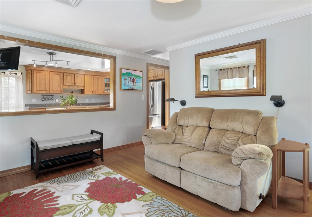 27 Atlantic House Road Hull, MA 02045 - Photo 13 of 30 a living room with furniture and a window