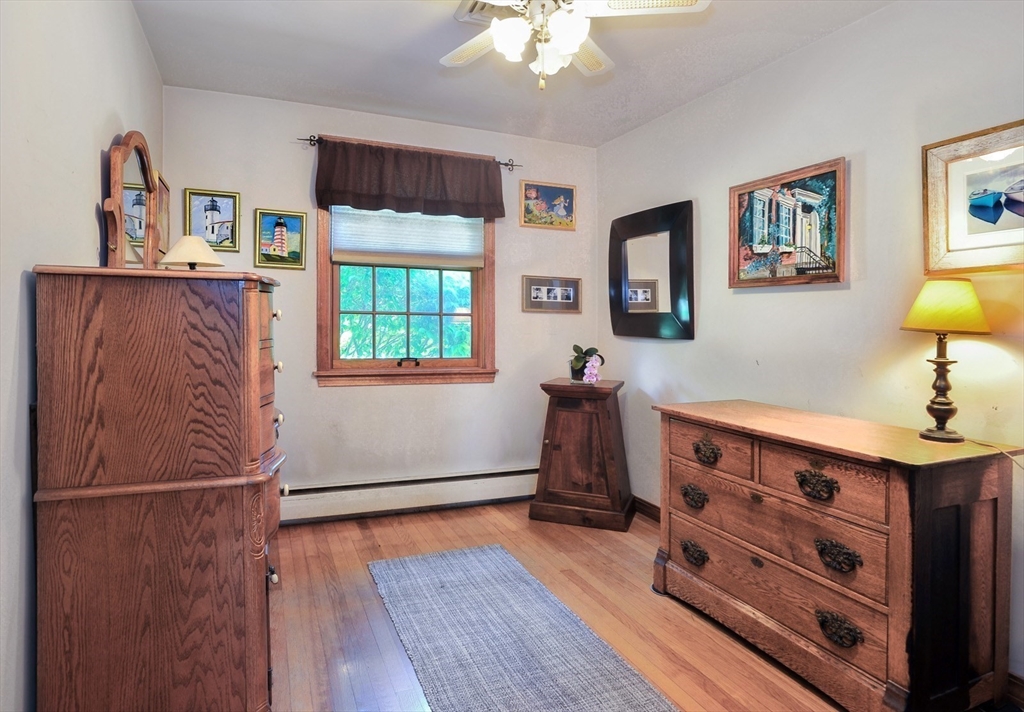 27 Atlantic House Road Hull, MA 02045 - Photo 20 of 30 a room with furniture and a window