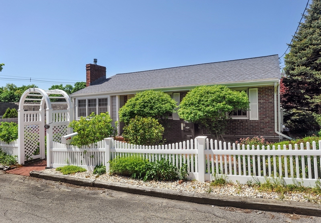 27 Atlantic House Road Hull, MA 02045 - Photo 9 of 30 a front view of a house with a garden