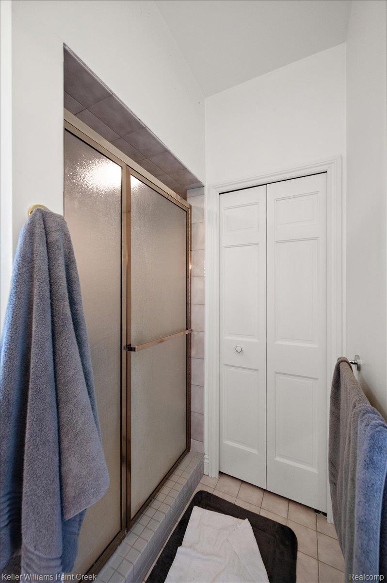69069 Campground Road Romeo, MI 48065 - Photo 49 of 78 Shower enclosure featuring frosted glass and a bronze-finish frame