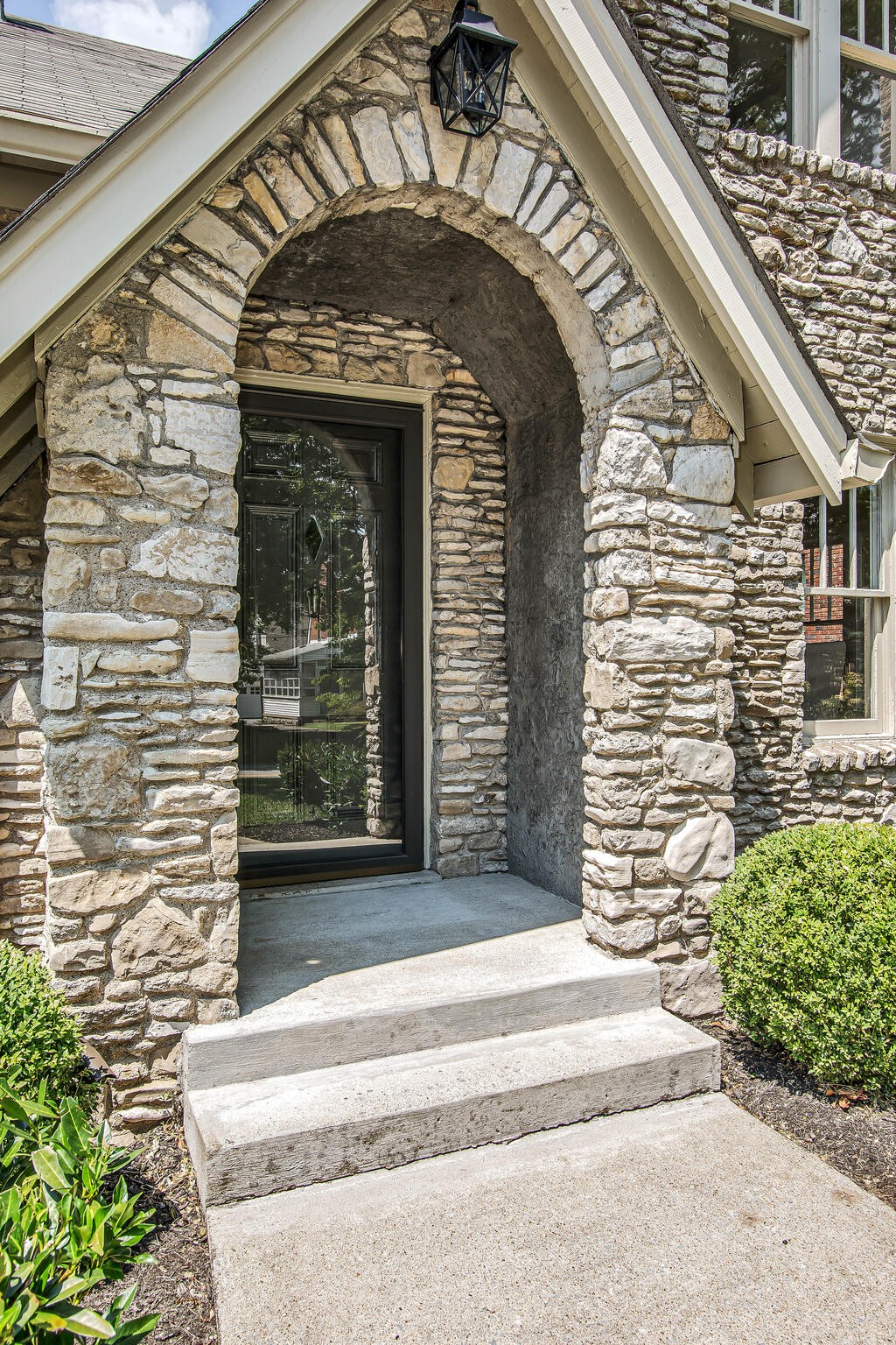 225 Cherokee Road Nashville, TN 37205 - Photo 2 of 47 a front view of a house with a outdoor space
