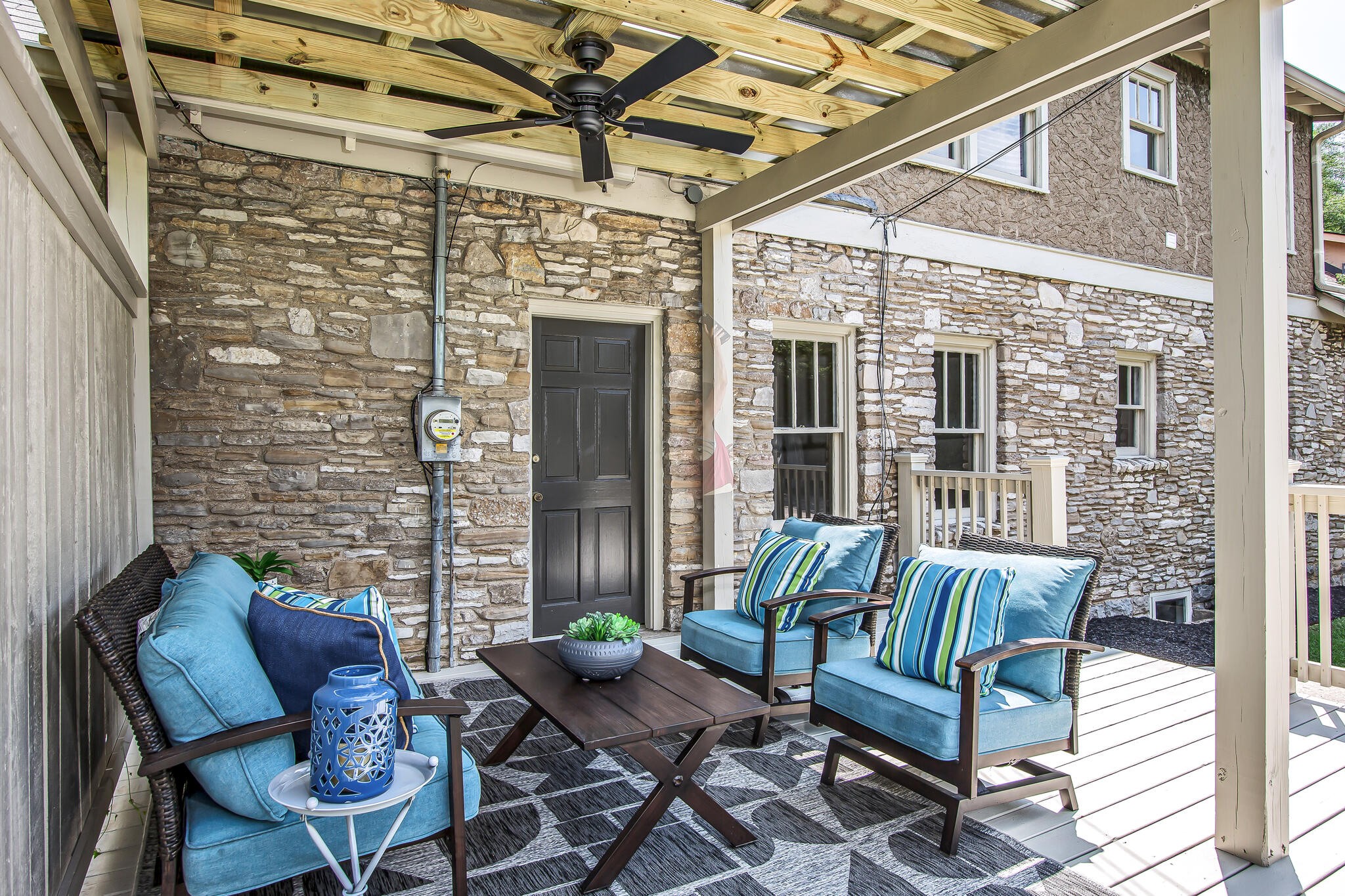 225 Cherokee Road Nashville, TN 37205 - Photo 33 of 47 a balcony with furniture and a potted plant