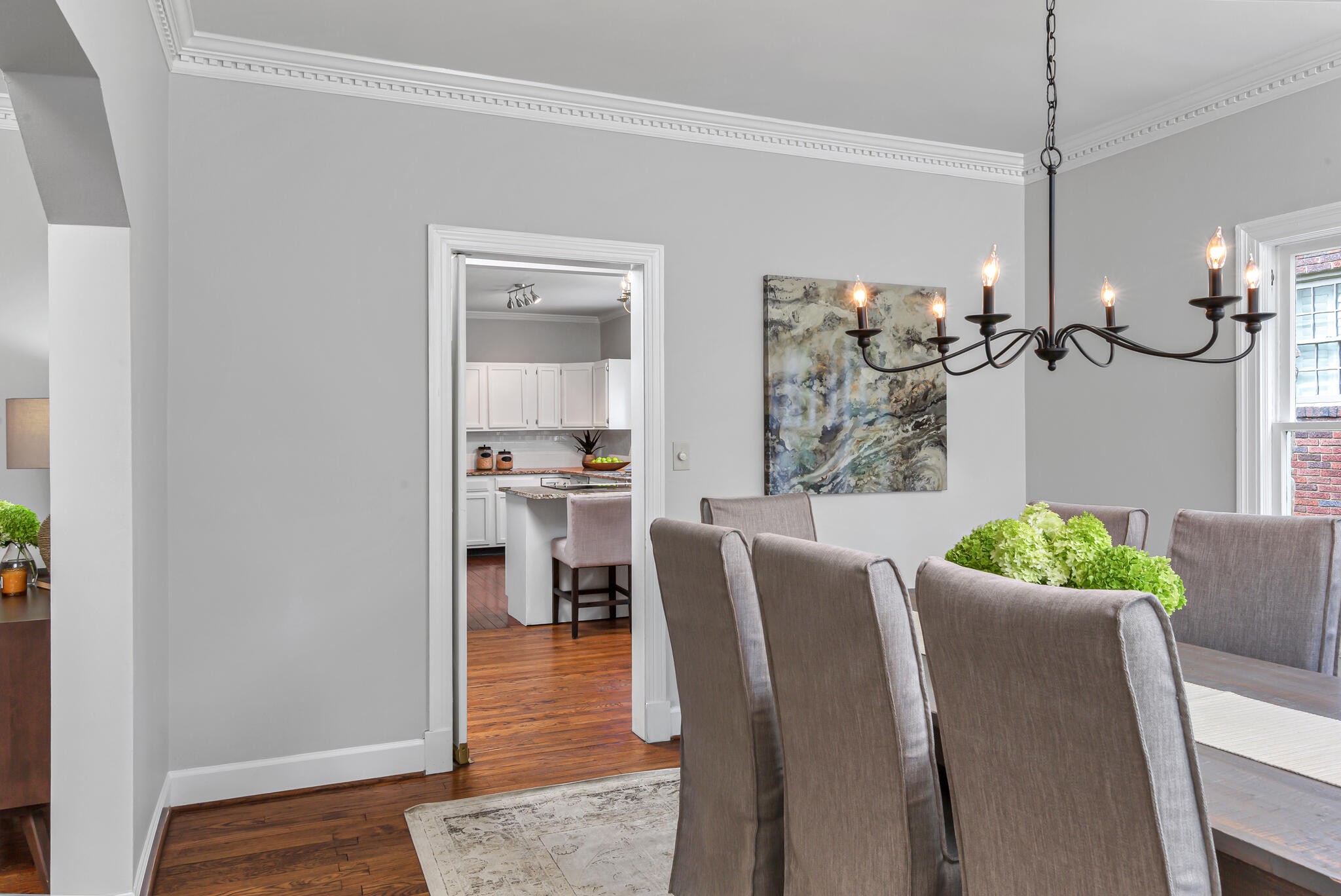 225 Cherokee Road Nashville, TN 37205 - Photo 10 of 47 a view of a dining room with furniture and a chandelier