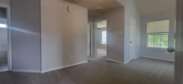 a view of a room with an empty space