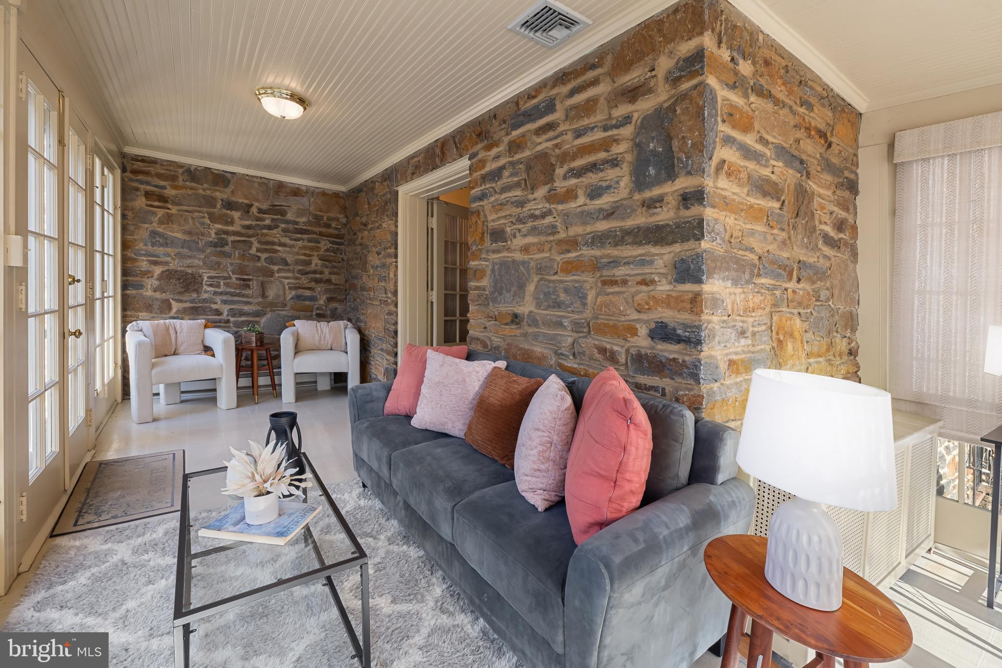 302 Tunbridge Road Baltimore, MD 21212 - Photo 11 of 77 Charming sunlit space with stone accents.