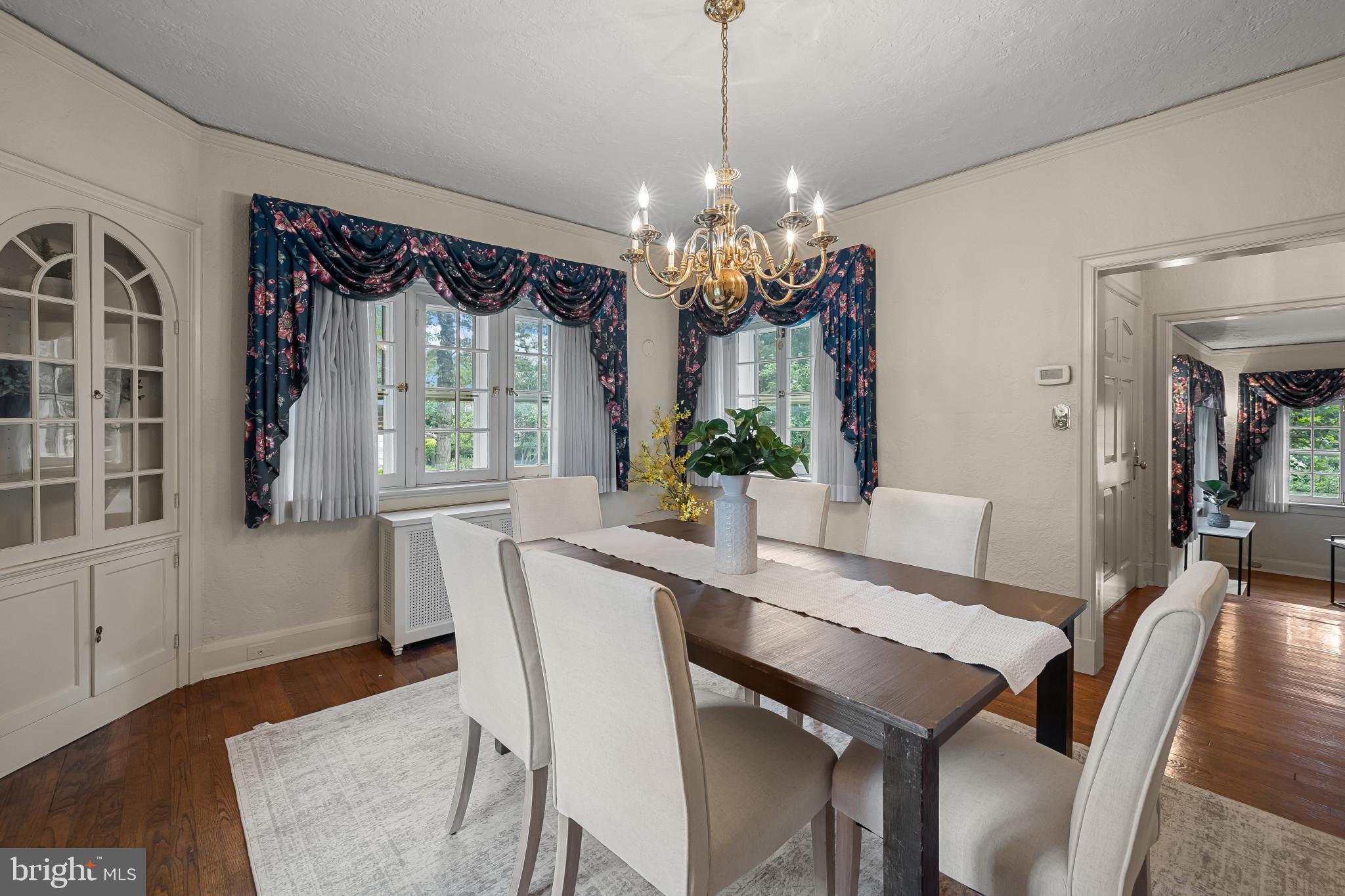 302 Tunbridge Road Baltimore, MD 21212 - Photo 14 of 77 Elegant dining space with natural light.