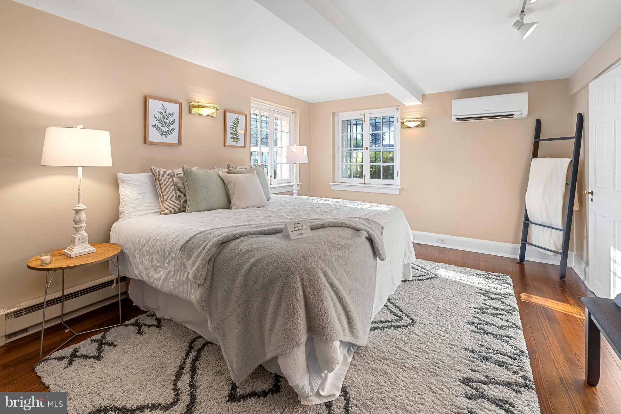 302 Tunbridge Road Baltimore, MD 21212 - Photo 23 of 77 Serene bedroom with natural light and warmth.