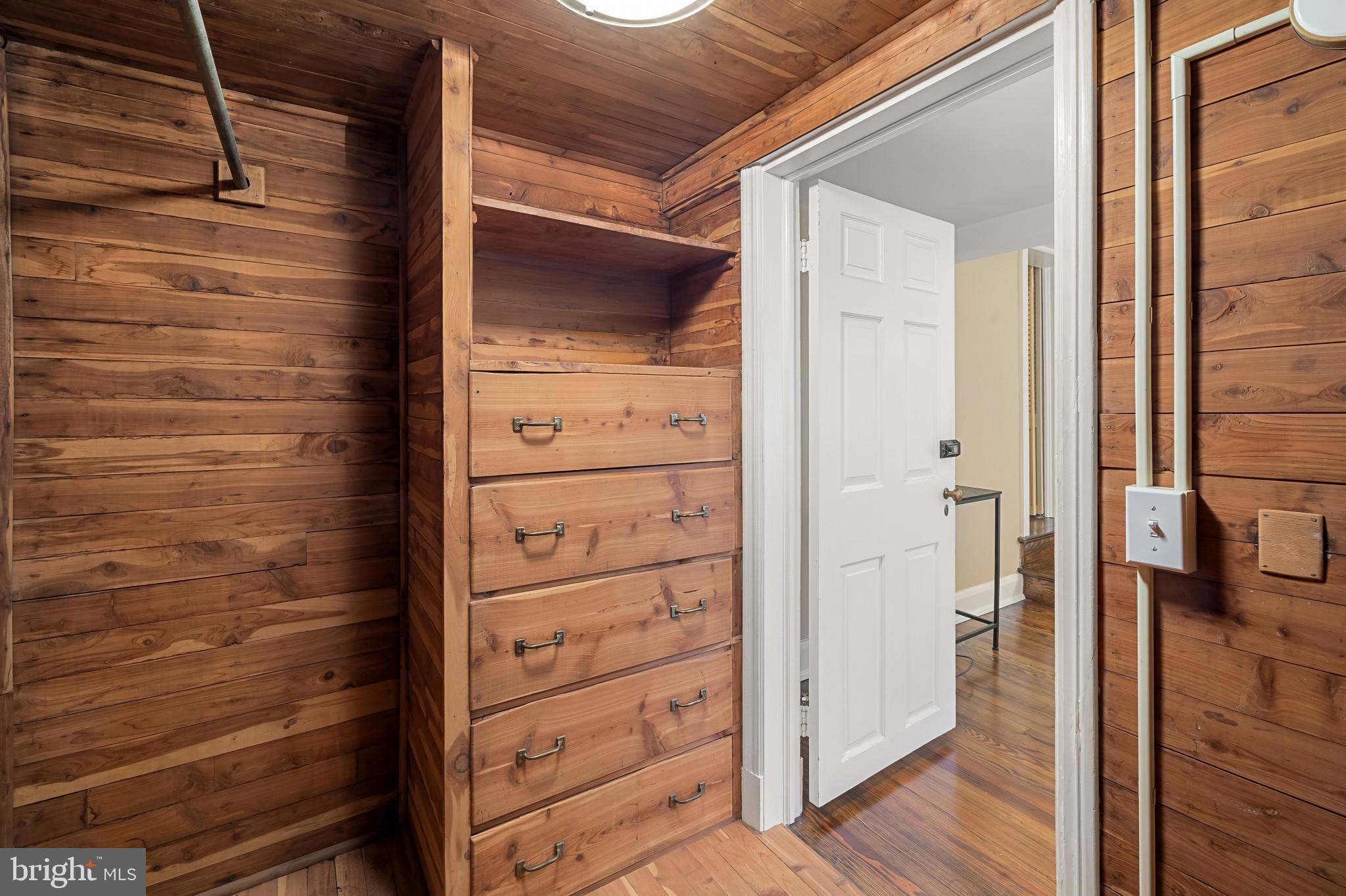 302 Tunbridge Road Baltimore, MD 21212 - Photo 24 of 77 Warm wooden accents enhance cozy storage space.