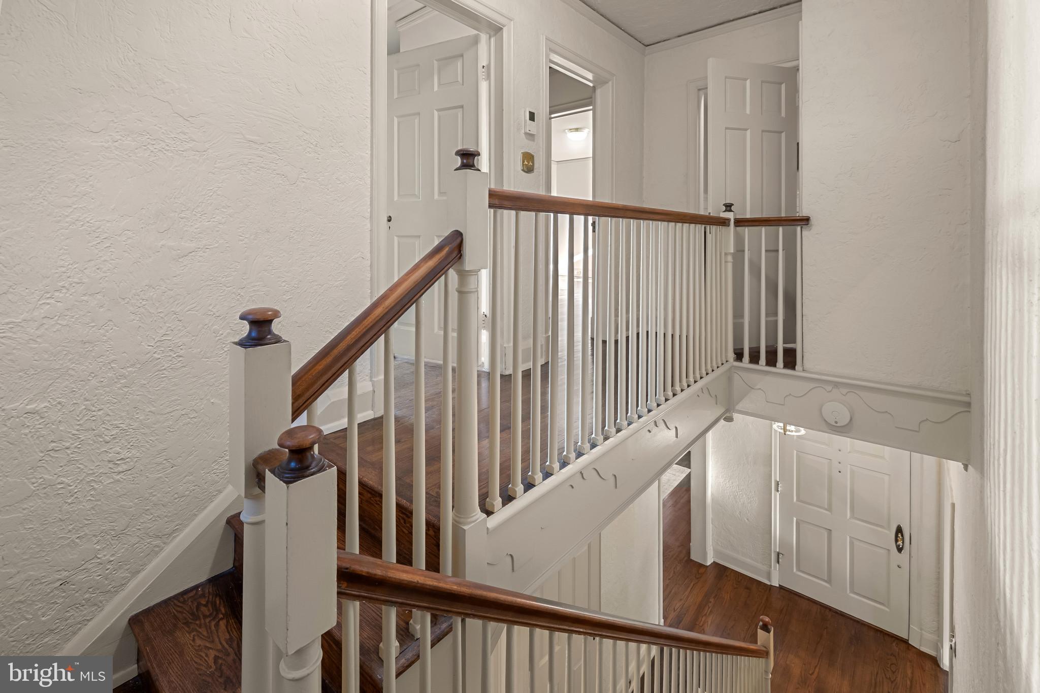 302 Tunbridge Road Baltimore, MD 21212 - Photo 27 of 77 Elegant staircase with classic charm.