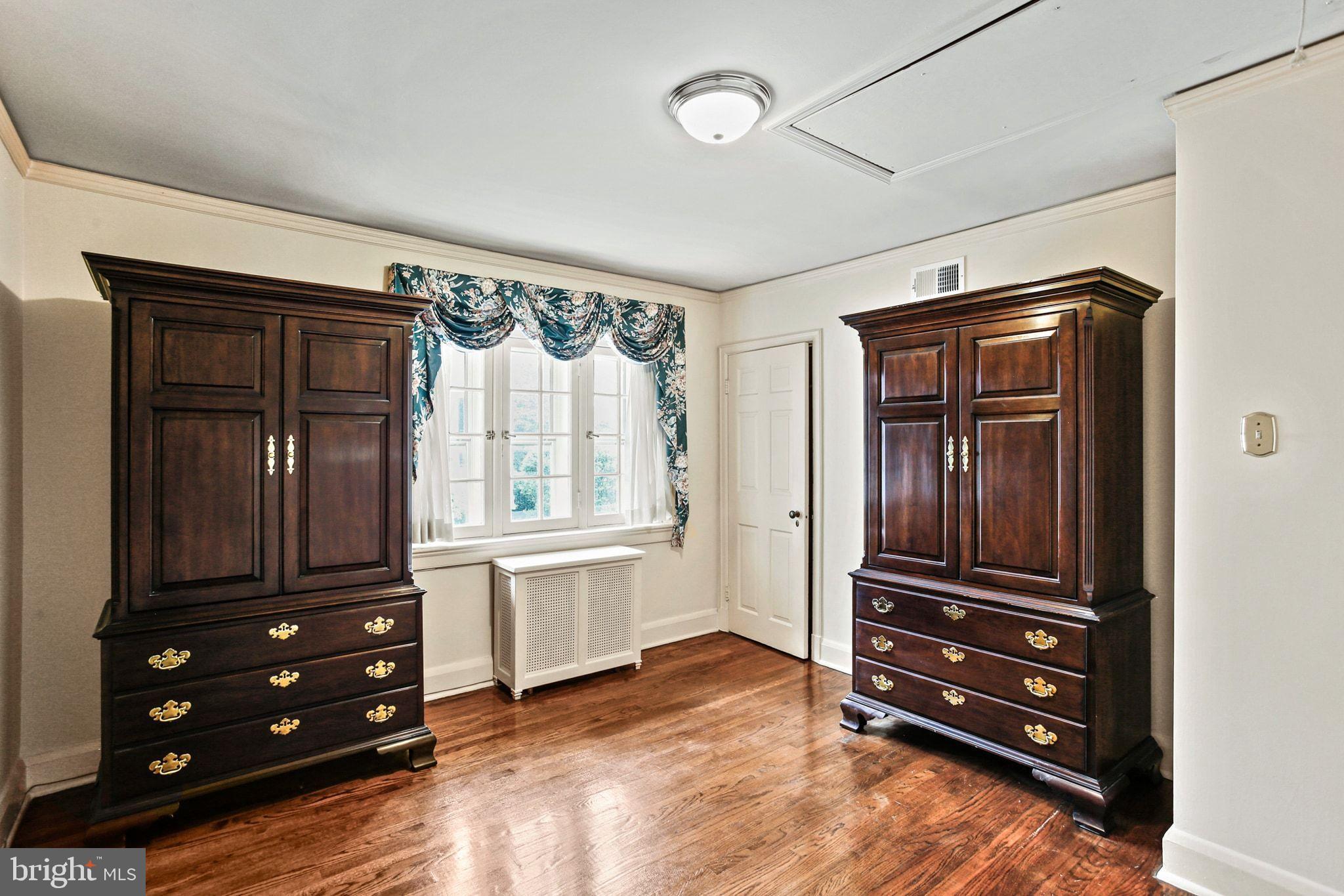 302 Tunbridge Road Baltimore, MD 21212 - Photo 39 of 77 a view of walk in closet with clothes and shoes