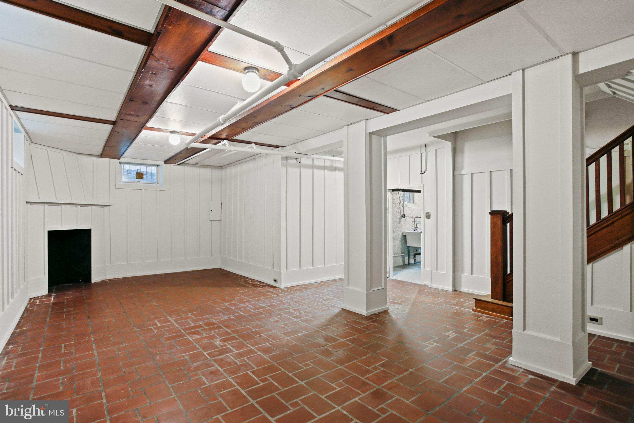 302 Tunbridge Road Baltimore, MD 21212 - Photo 44 of 77 Large basement with exposed vaulted ceilings.