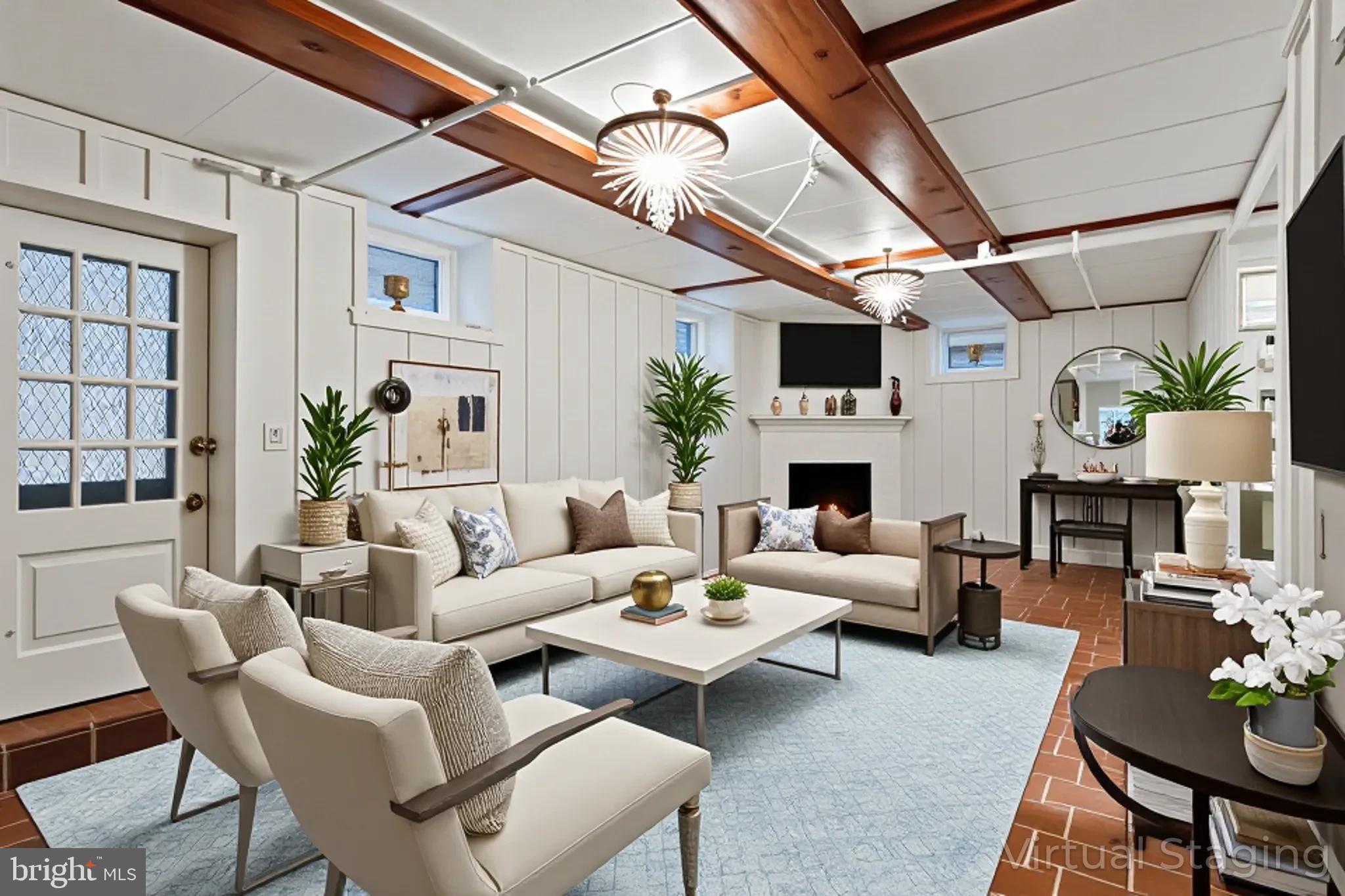 302 Tunbridge Road Baltimore, MD 21212 - Photo 47 of 77 a living room with furniture fireplace and a chandelier