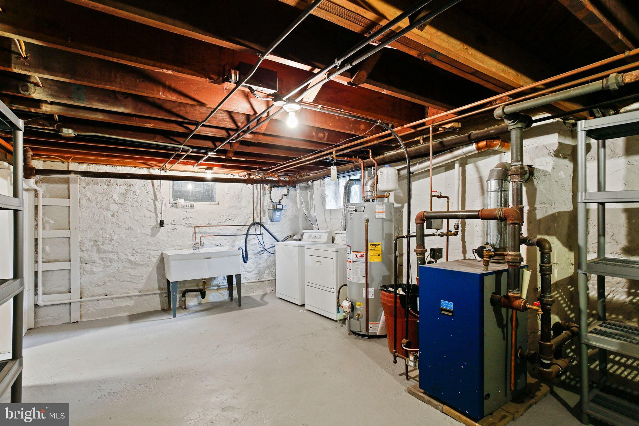 302 Tunbridge Road Baltimore, MD 21212 - Photo 50 of 77 Spacious basement with utility features.