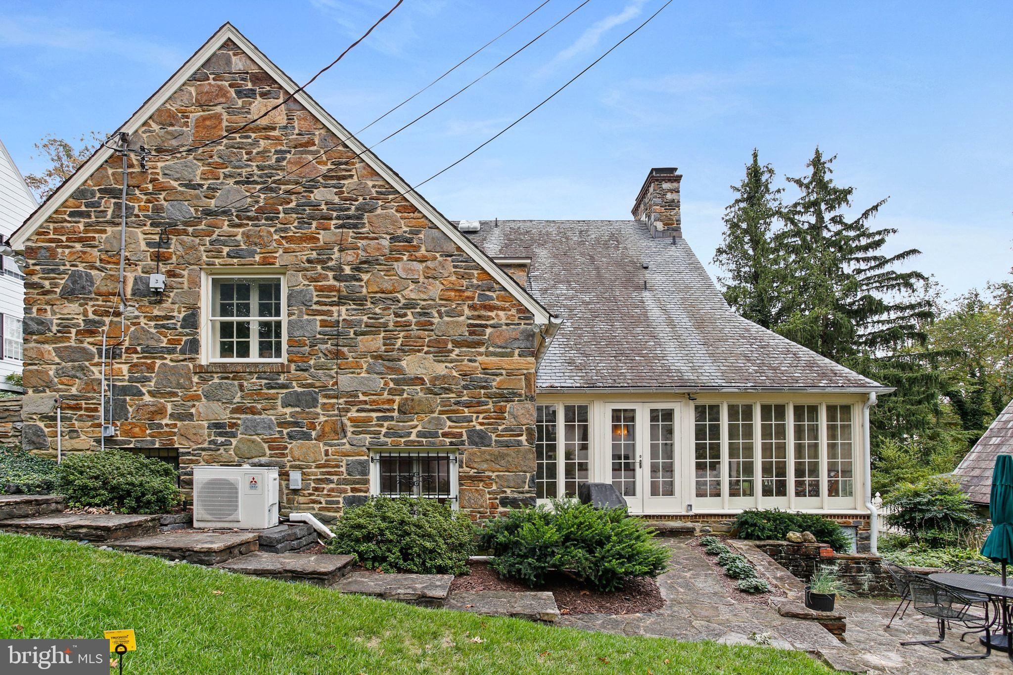 302 Tunbridge Road Baltimore, MD 21212 - Photo 56 of 77 Charming stone home with lush greenery.