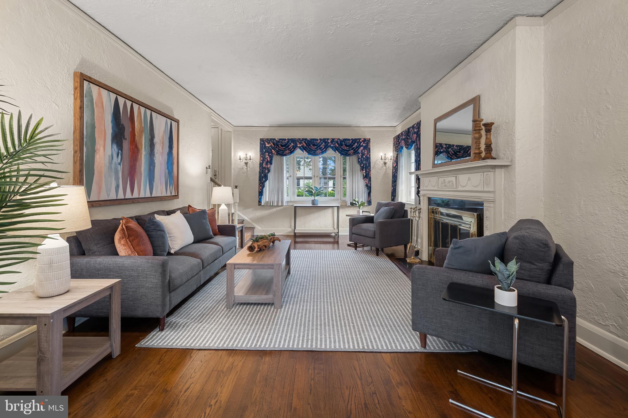 302 Tunbridge Road Baltimore, MD 21212 - Photo 8 of 77 a living room with furniture fireplace and flat screen tv