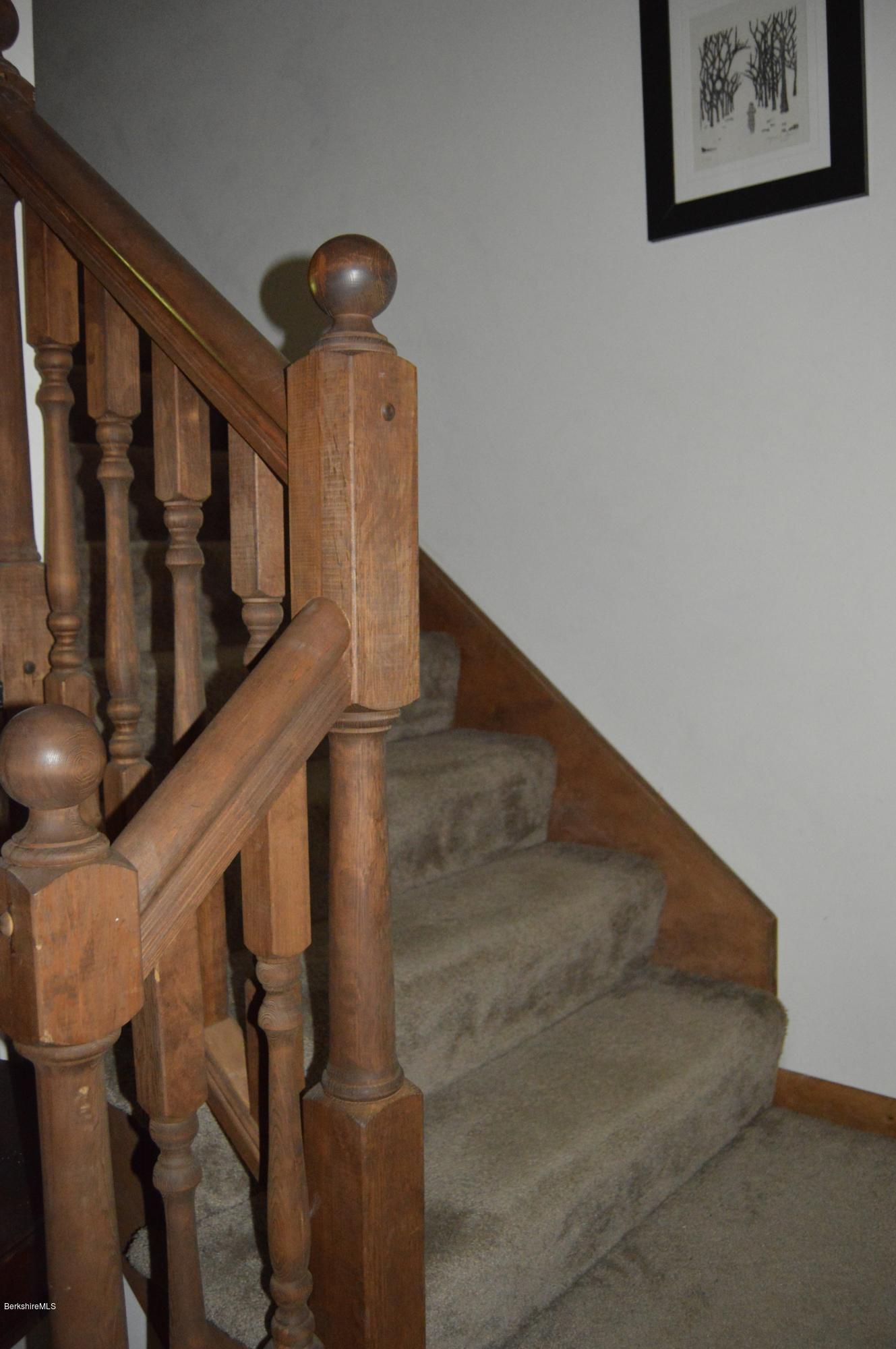 2965 Hancock Road Hancock, MA 01267 - Photo 18 of 33 a view of staircase with lots of frames on wall