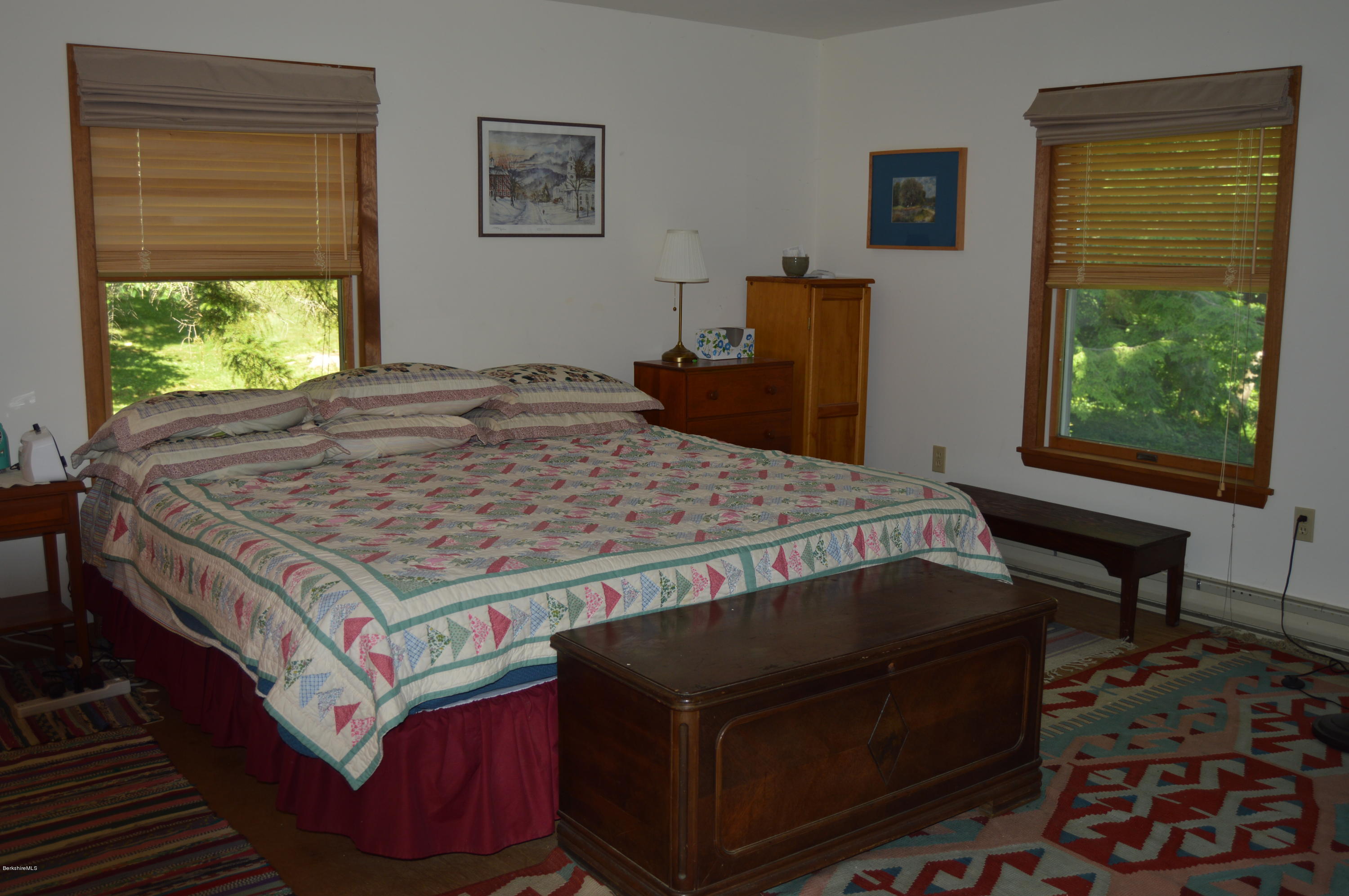 2965 Hancock Road Hancock, MA 01267 - Photo 19 of 33 a bed sitting in a bedroom next to a window