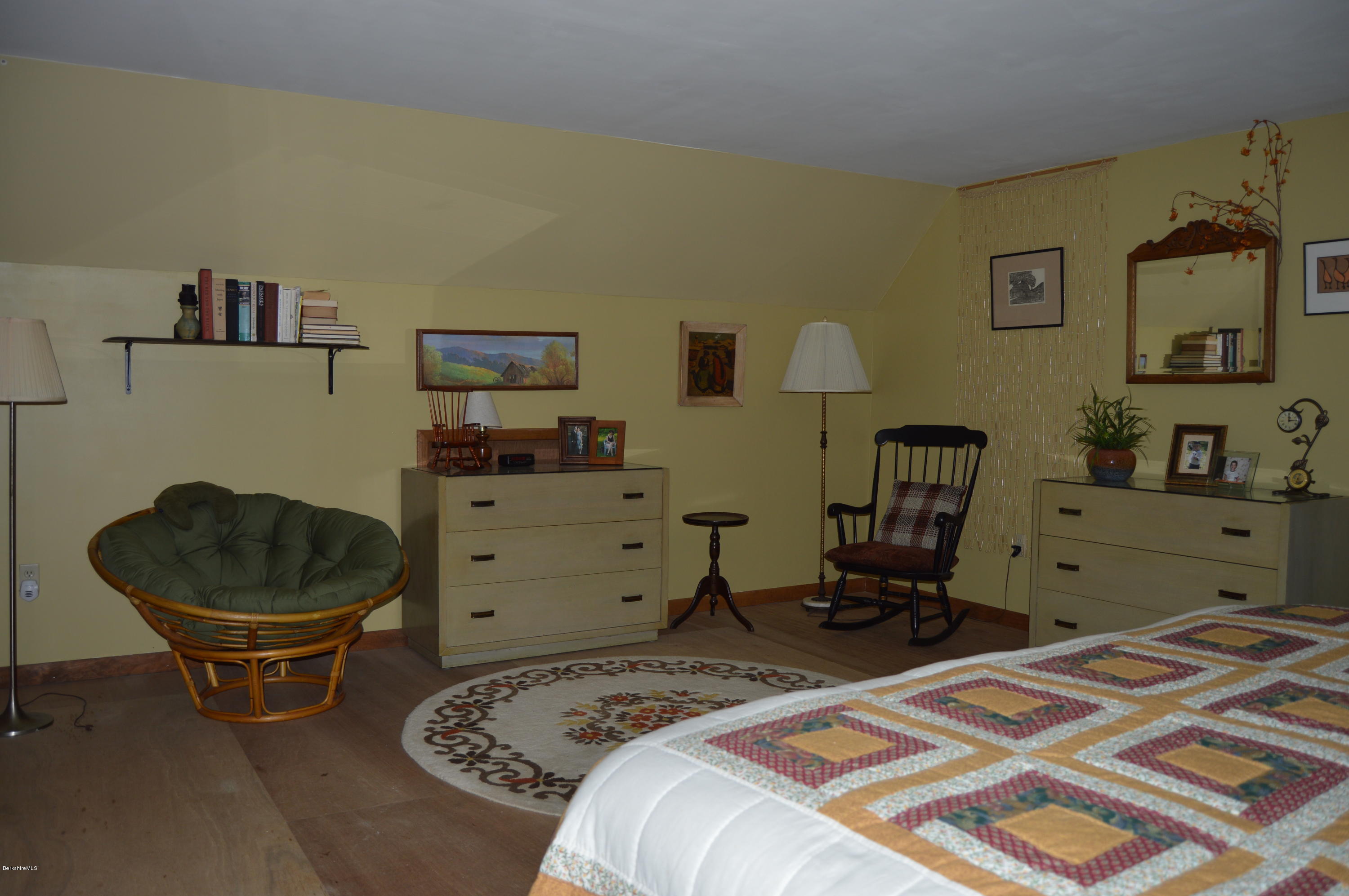 2965 Hancock Road Hancock, MA 01267 - Photo 24 of 33 a bedroom with a bed and a chair in it