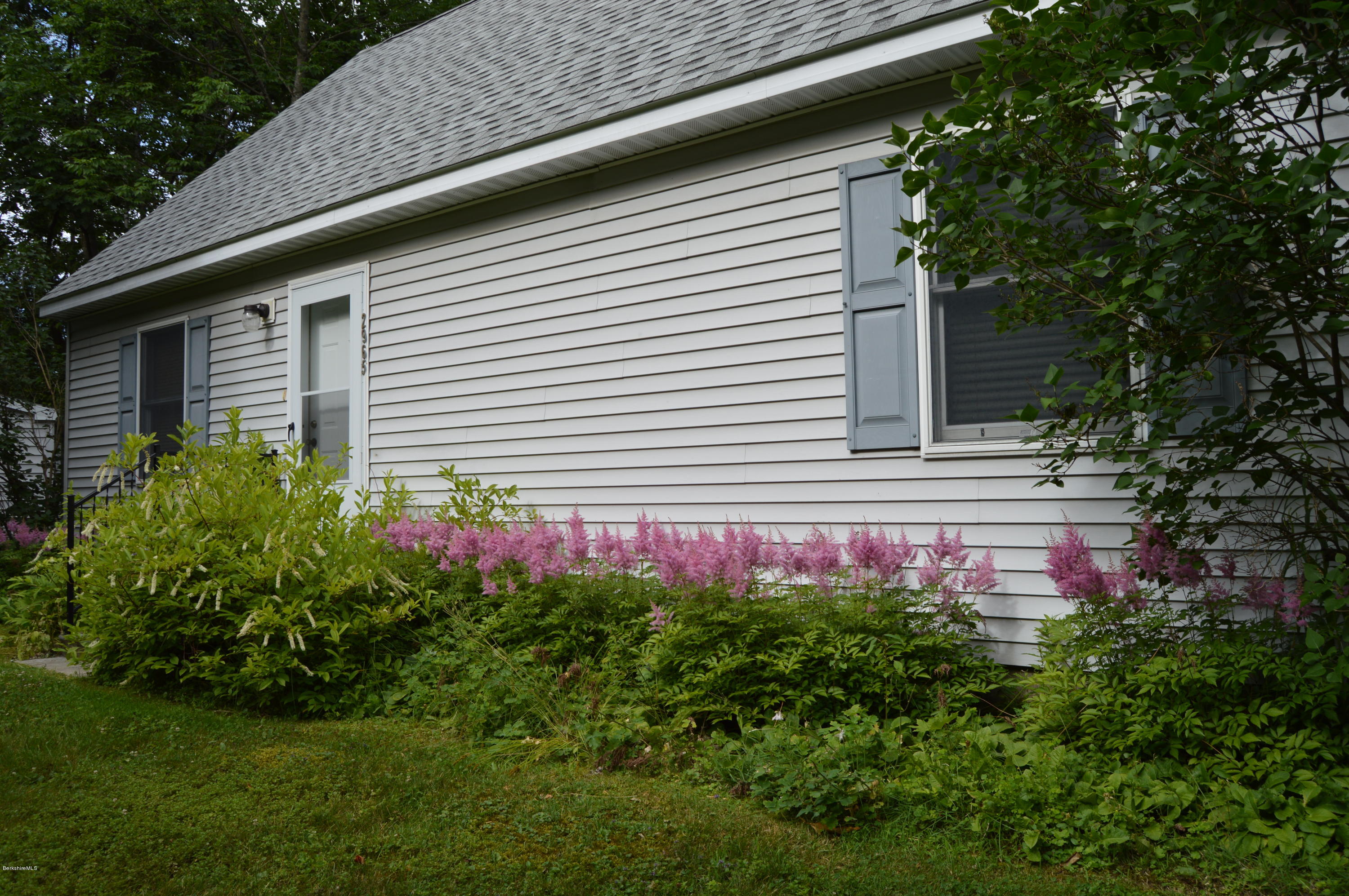 2965 Hancock Road Hancock, MA 01267 - Photo 5 of 33 a view front of house with a yard and potted plants